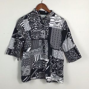 Vintage Andrew McMullan Black & White mixed print top with pockets. Size large.